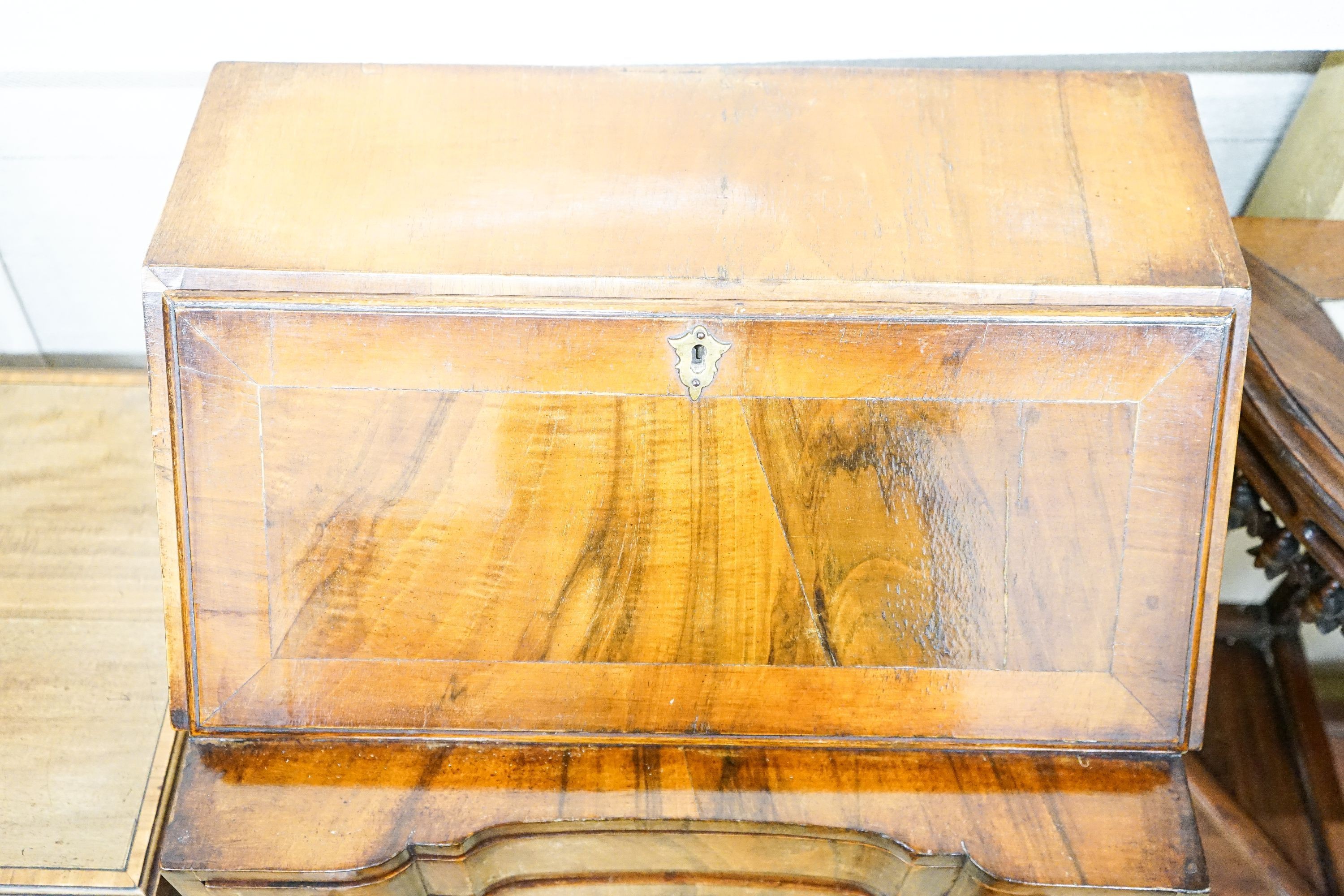 A small Queen Anne revival walnut bureau, width 52cm, depth 37cm, height 91cm together with an Edwardian satinwood banded folding mahogany card table